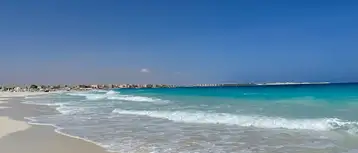 دليل زيارة شاطئ الأبيض