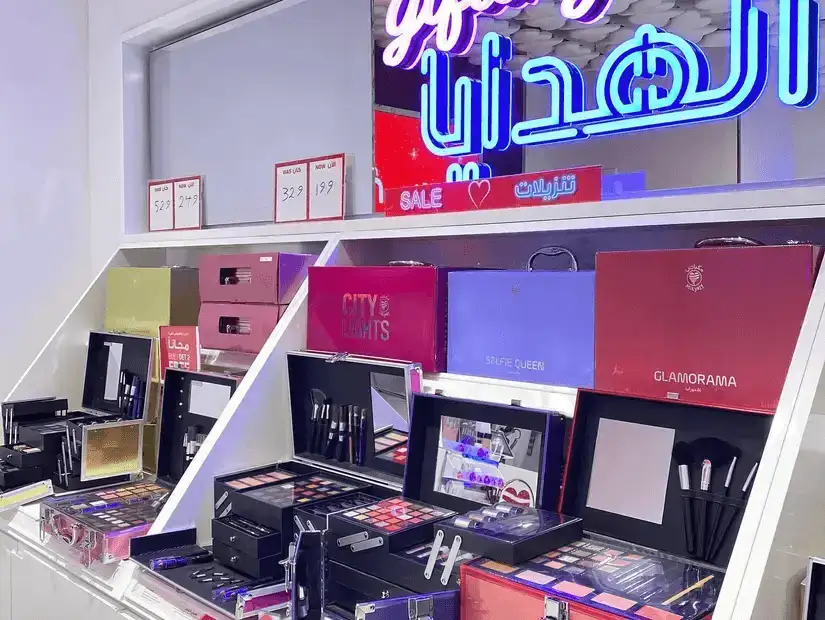 Interior view of Al Noor Mall, showcasing multiple levels filled with shops and visitors.