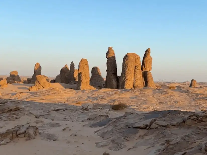 Striking rock formations standing guard in the AlUla desert.