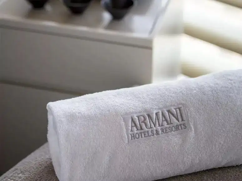 White towel with Armani logo