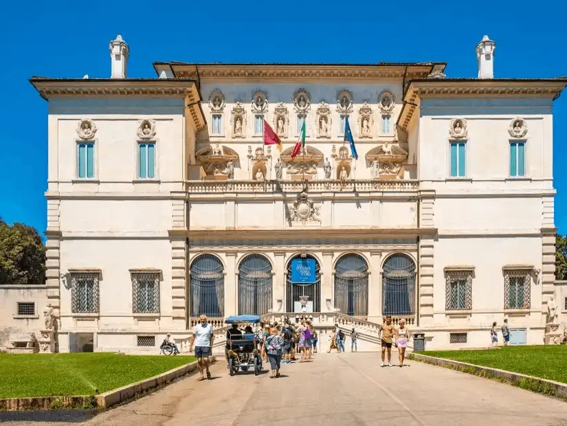 The elegant façade of the Borghese Gallery on a bright sunny day.