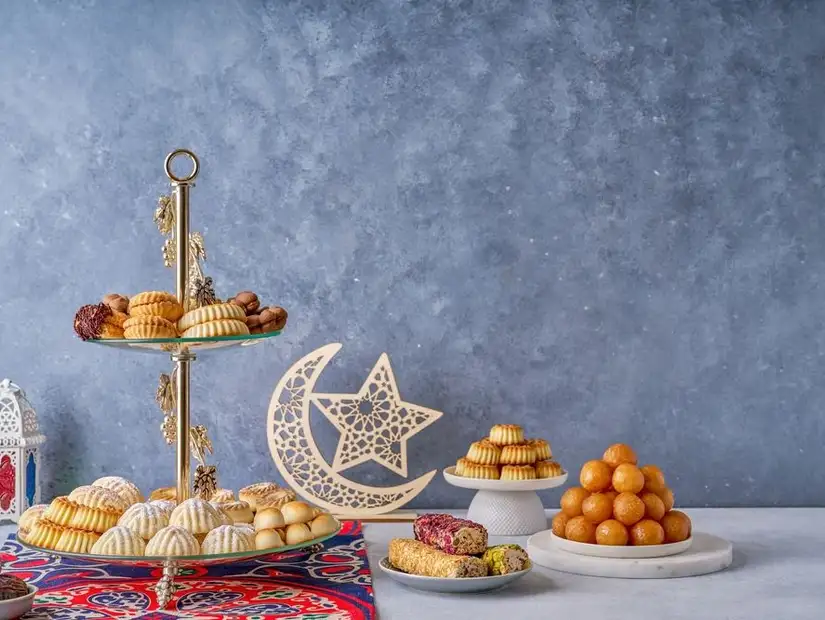 An array of traditional confections for Eid celebrations.