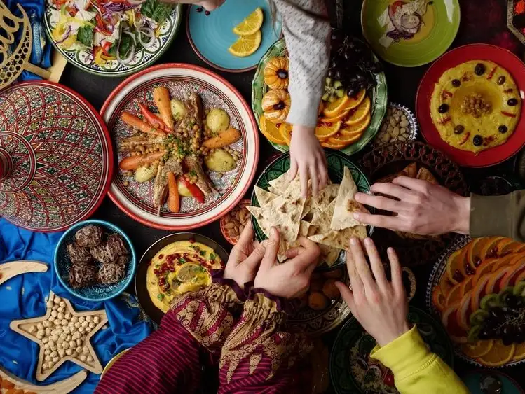 A communal setting of festive dishes for Eid al-Fitr.