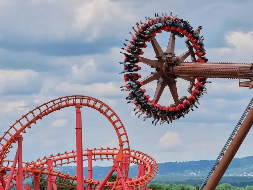 Thrill-seekers enjoying the high-speed rides at Energylandia, Poland's largest amusement park.