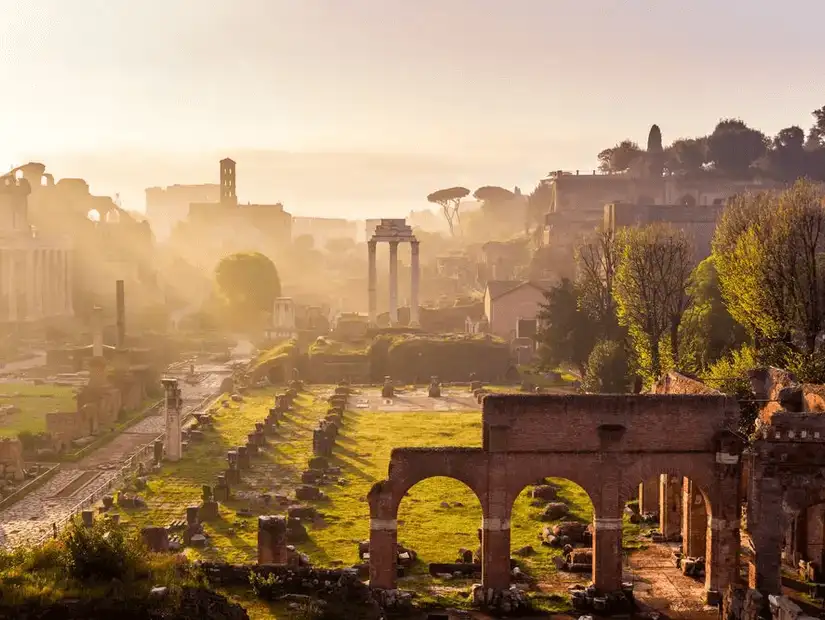 A serene view of the ancient Roman Forum bathed in golden morning light.