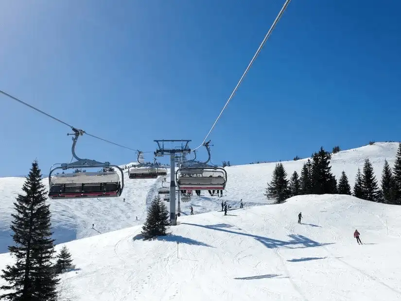 Skiers enjoy the pristine slopes of Jahorina Mountains.