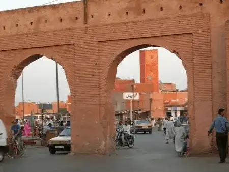 The traditional arches of a bustling Marrakesh street.