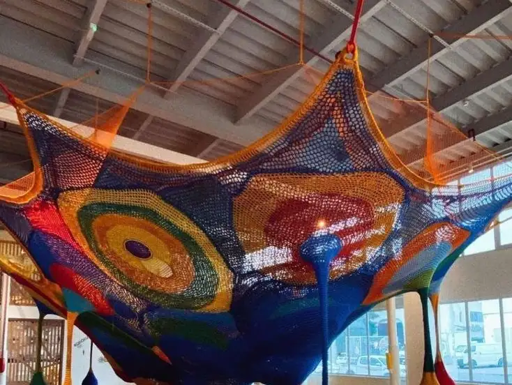 Colorful hanging play net.