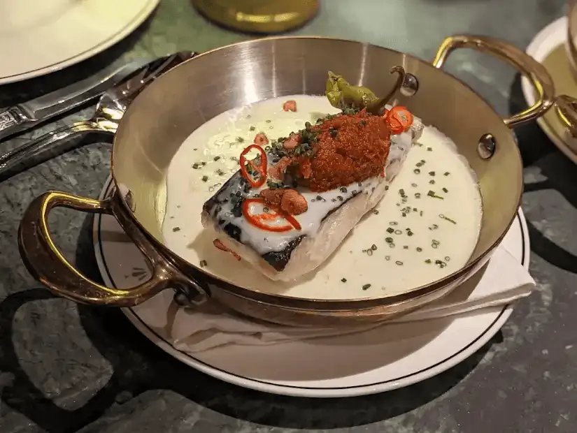 Elegant dining experience featuring an upscale restaurant setting.