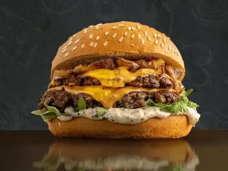 Double-stacked cheeseburger with lettuce and special sauce.