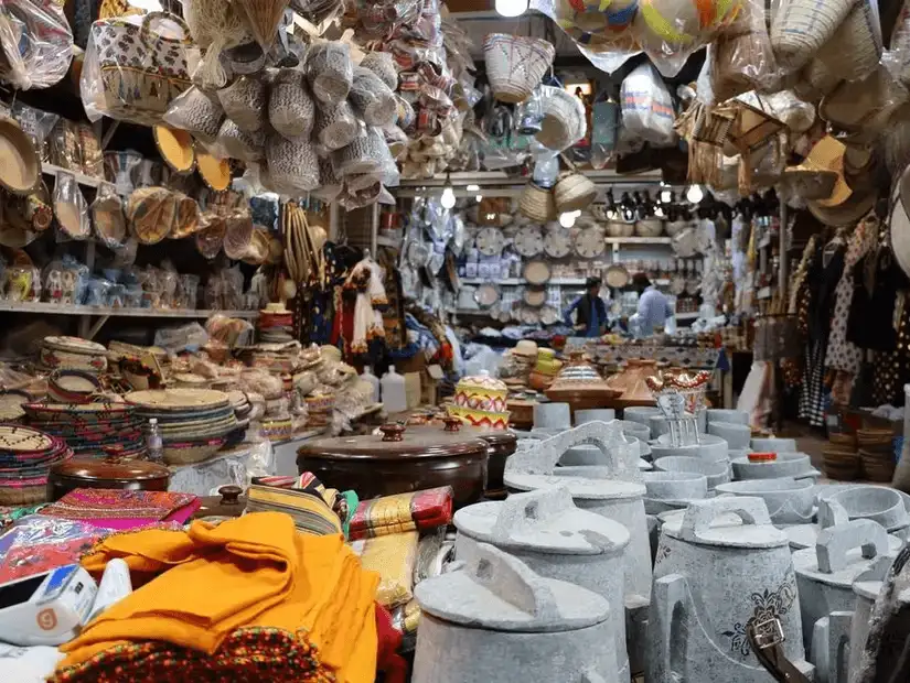 Traditional market filled with diverse handicrafts and kitchenware.