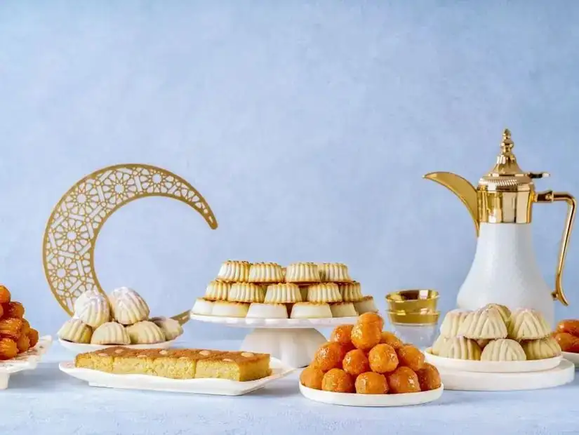 assorted traditional Arabic Eid al Fitr sweets and Ramadan decor