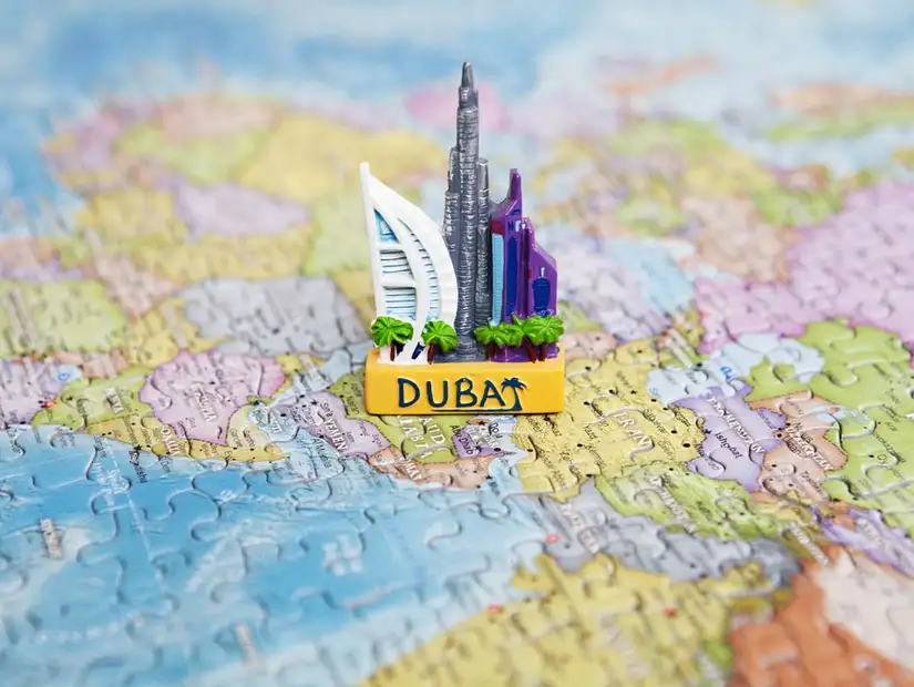 Detailed miniatures of iconic Dubai buildings on display at a gallery.