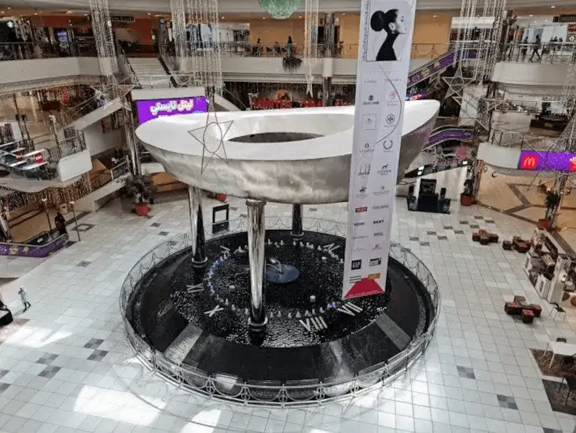 Modern architecture and spacious interior of Al-Rashed Mall.