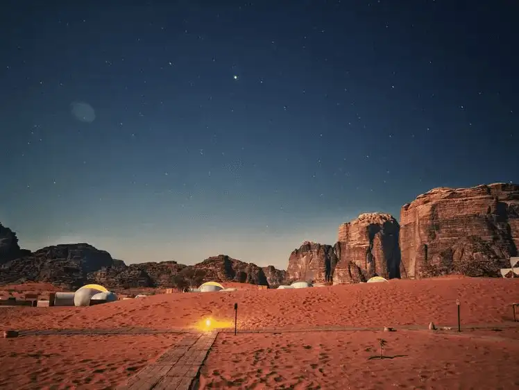 Desert camping in Wadi Rum offers a peaceful escape with scenic rock formations.