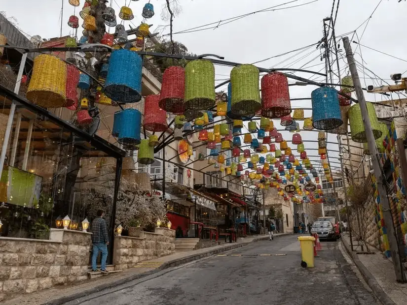 Colorful lanterns brightening a lively street, enhancing the urban atmosphere.