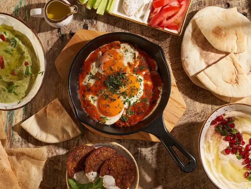 Charming Emirati breakfast spread at the cozy Arabian Tea House.