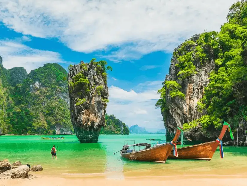 Traditional long-tail boats resting on the serene waters of Bang Nga District.