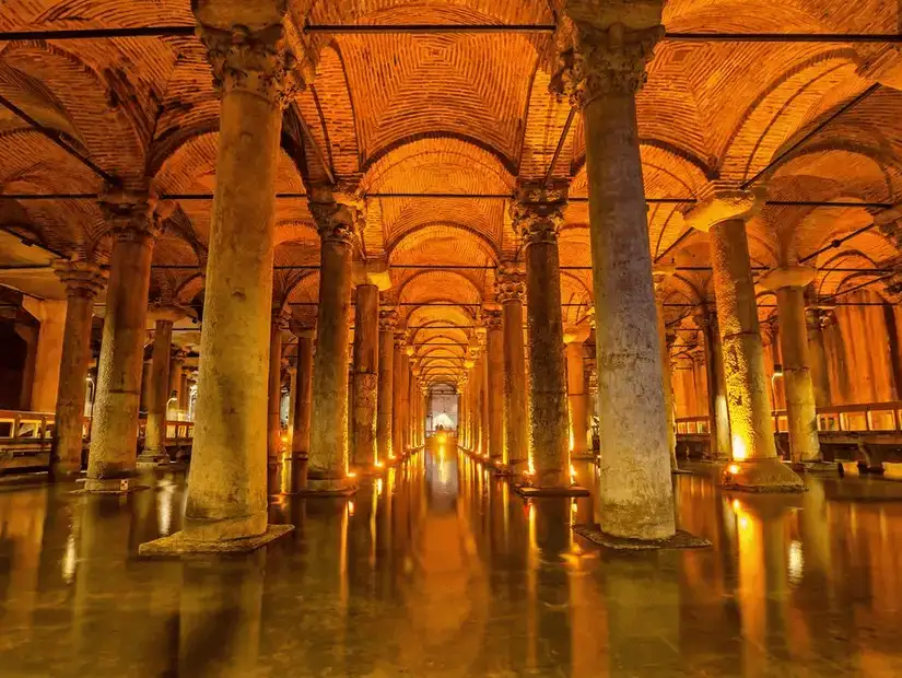 An underground ancient cistern with rows of columns and ambient lighting, reflecting a tranquil atmosphere.