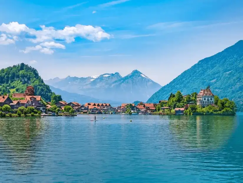 Picturesque village of Brienz nestled by the lake and mountains.