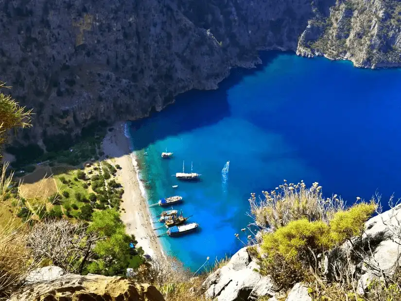 A breathtaking view of Butterfly Valley with its turquoise waters and lush surroundings.