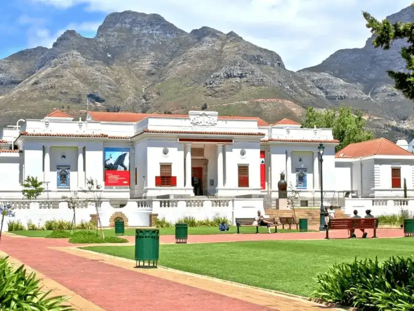 The Iziko South African Museum, a cultural landmark against a mountain backdrop.