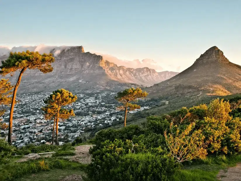 Majestic Table Mountain illuminated by the golden hues of sunset.