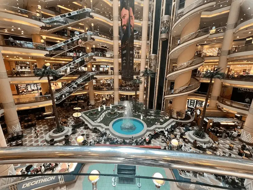 interior fountain and shoppers at Citystars Mall