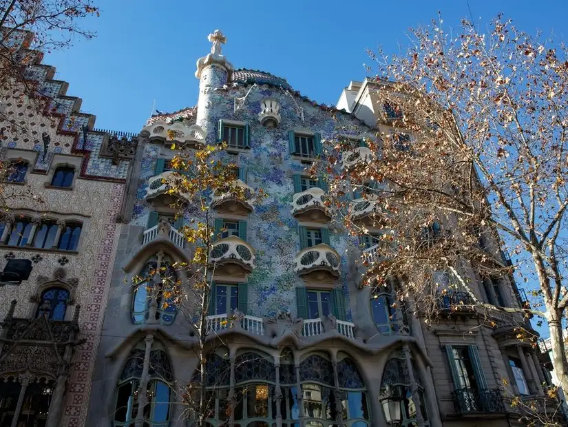 A whimsical Gaudí masterpiece known for its colorful façade and bone-like balconies.