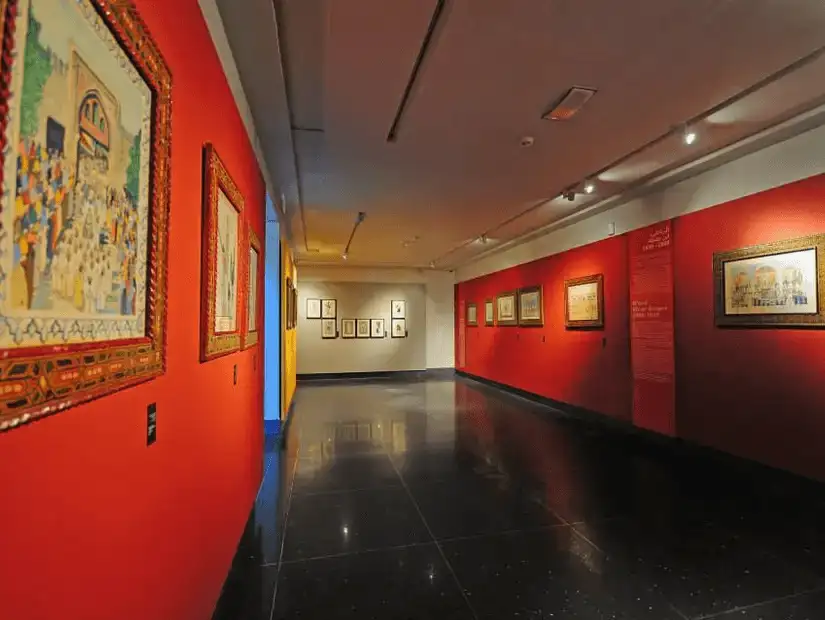 Interior of an art gallery in Casablanca with paintings on display.