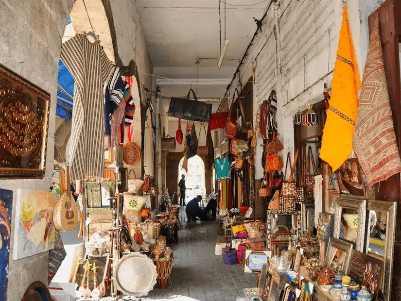 Busy marketplace in Casablanca with various stalls and people shopping.