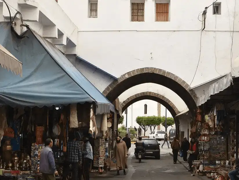 Beautifully decorated entrance of a traditional Moroccan building.