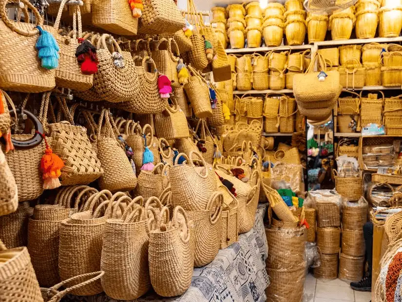 A vibrant display of woven baskets and bags at Chatuchak Weekend Market.