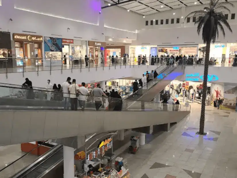 Busy shopping experience at Darren Mall with multiple levels.