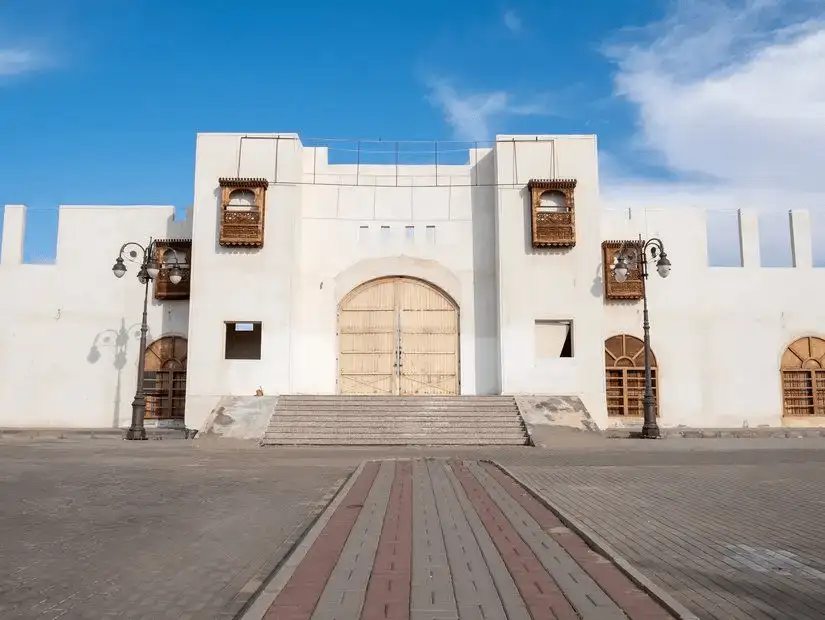 Facade of Darul Imara, showcasing traditional architecture with distinct windows and doors.