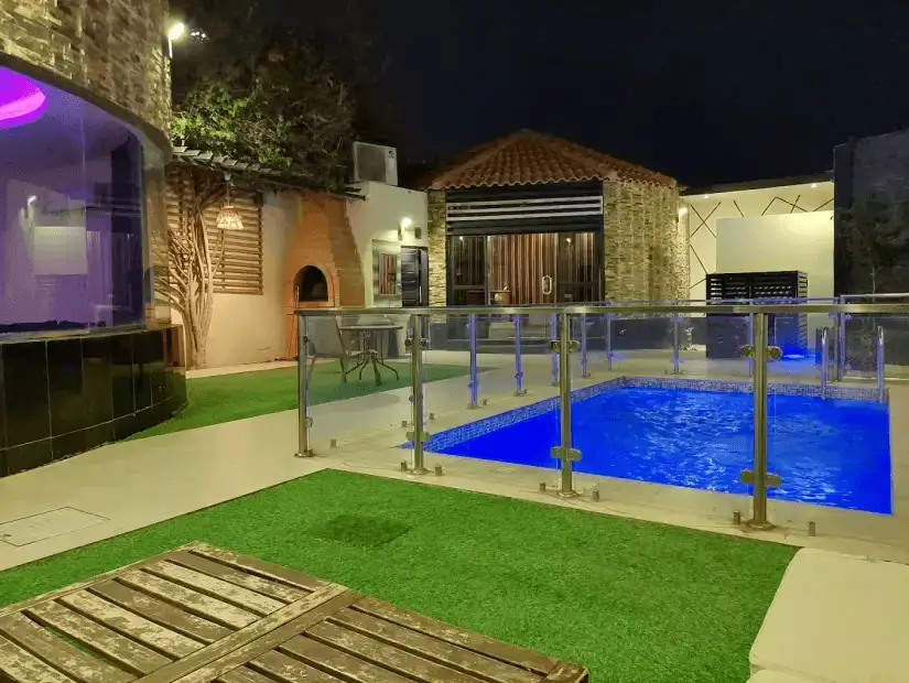 Modern chalet with a pool and contemporary outdoor design.