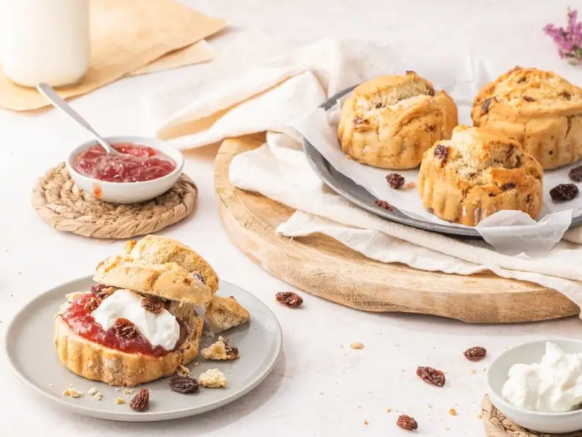 A traditional afternoon tea spread with mini sandwiches and pastries 