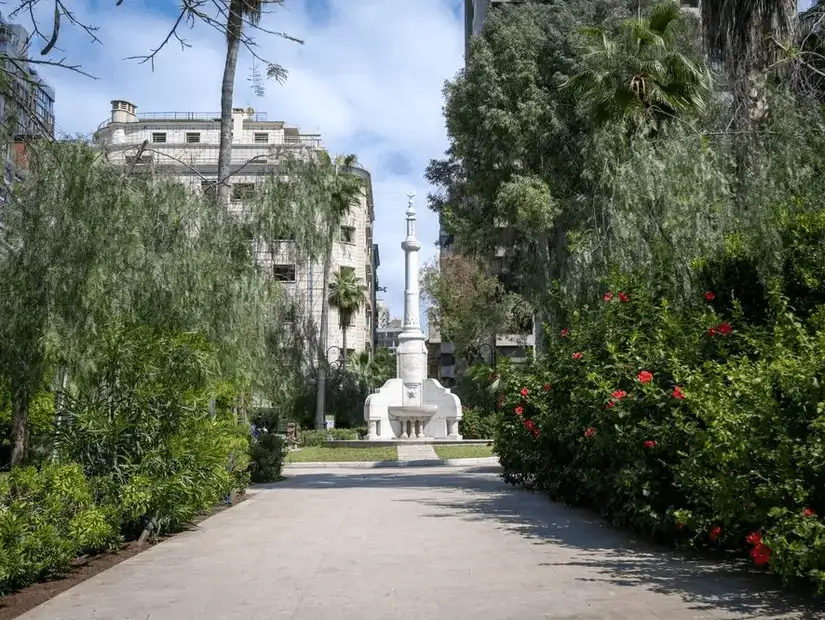 The tranquil Garden of Crafts, nestled within Beirut, surrounded by lush greenery and quiet pathways.