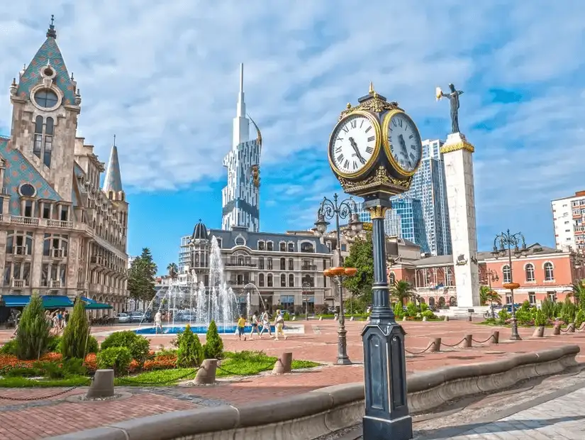 A picturesque square in Batumi, Georgia, with stunning architecture, fountains, and a clock tower.