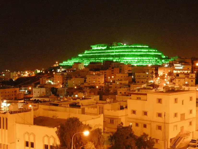 The illuminated terraces of Green Mountain offer a spectacular view, lighting up the city's skyline.