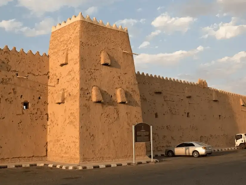 A historic mud-brick fortress standing resilient under the soft evening light.