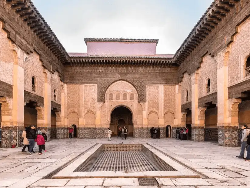 The historic courtyard of Ibn Youssef School, a beautiful example of Islamic architecture in Marrakesh.