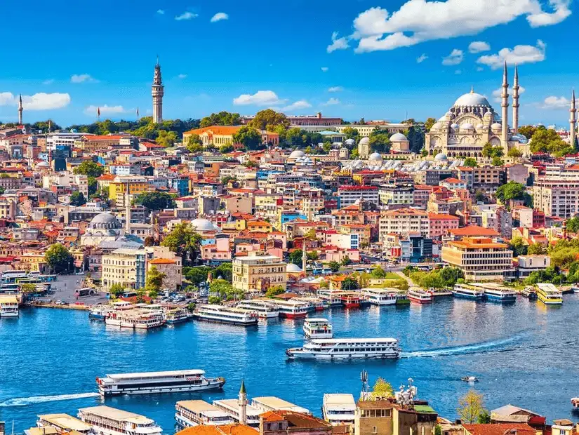 A vibrant view of the Golden Horn with the historic skyline of Istanbul in the background.