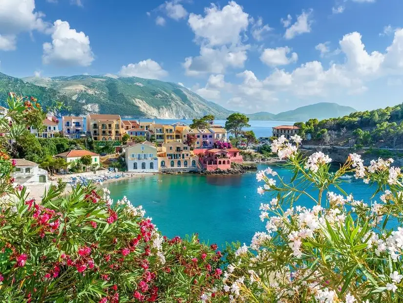 Crystal-clear waters and colorful villas offer a serene retreat in Assos.