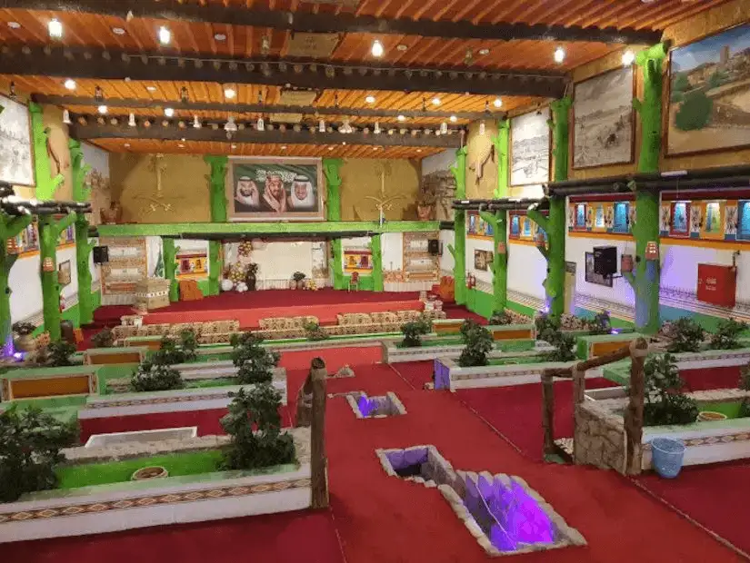 A traditional cultural hall with vibrant decor and seating areas.