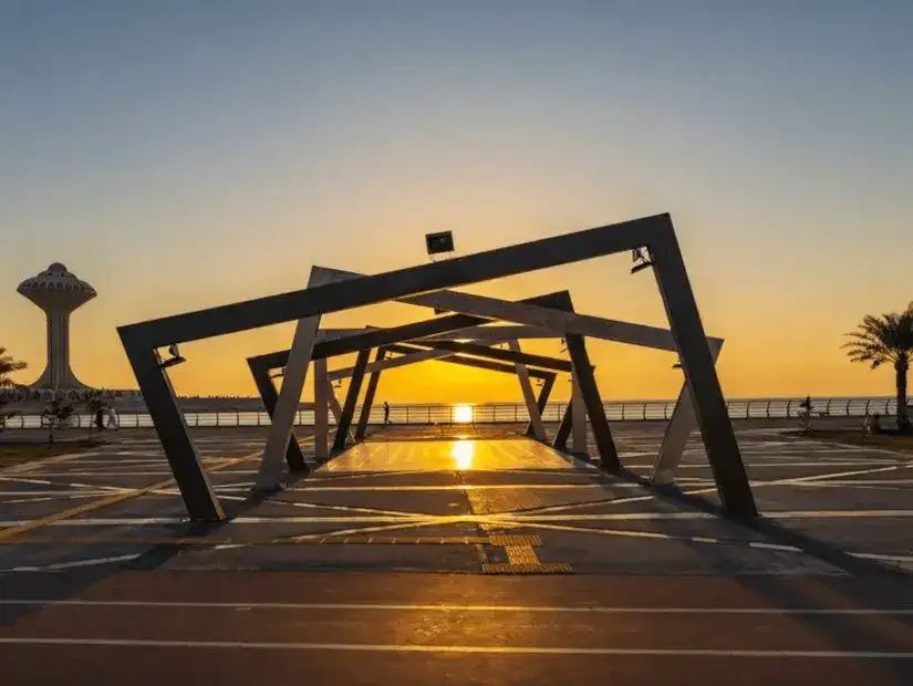 Modern art installation at Khobar Corniche during sunset.
