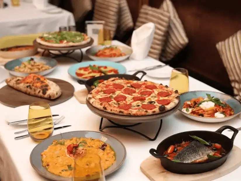 Cozy dining spread with artisanal bread and healthy salads.