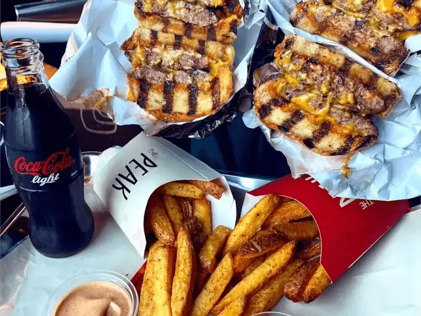 Crunchy breaded cutlets served with rich curry and fries.