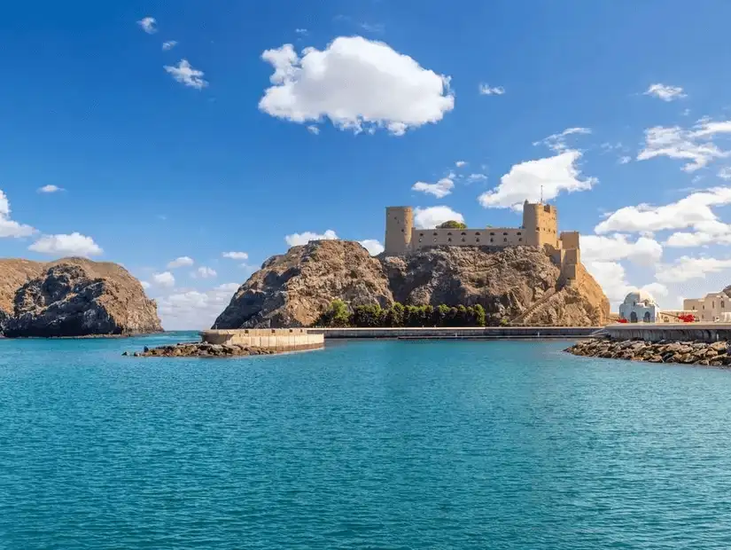 The imposing Al Jalali Fort standing proudly by the sea, a reminder of Muscat’s historical defenses.