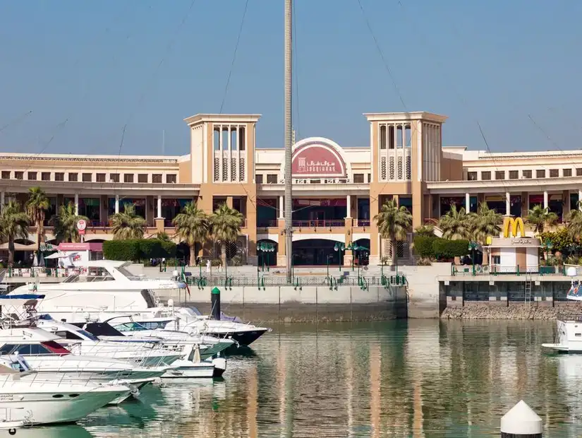 The picturesque Marina Mall, set against the backdrop of the Arabian Gulf in Kuwait.